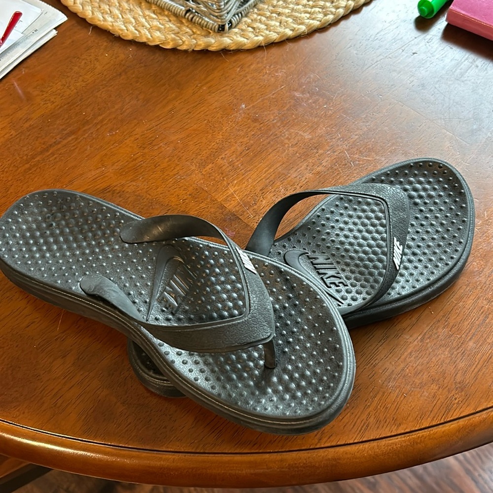 Black Nike flip flops size 9